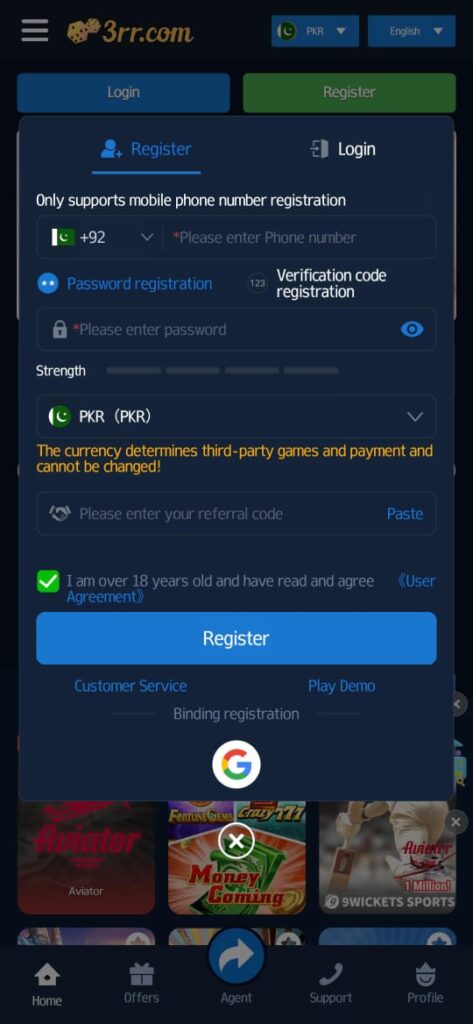 This image displays the registration page for 3RR Game, where users can sign up using their mobile phone number.

Registration Process & Features:
✅ Mobile Number Registration – Users must enter their phone number for registration.
✅ Password or Verification Code Option – Choose between password registration or SMS verification.
✅ Currency Selection (PKR) – The currency determines transactions and cannot be changed later.
✅ Referral Code (Optional) – Users can enter a referral code for bonuses.
✅ Age Confirmation – Users must confirm they are over 18 years old and agree to the terms.
✅ Google Login Option – Quick registration using a Google account.
✅ Customer Support & Demo Mode – Access support or try a demo game before registering.

This page ensures a secure and user-friendly registration process for new players. 